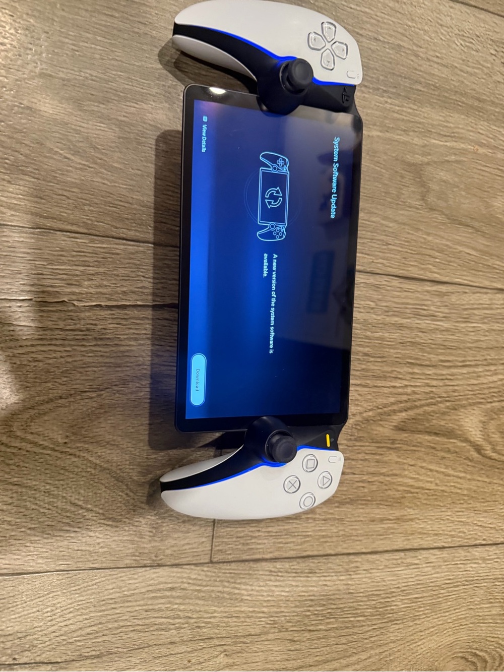 Sony PlayStation Portal Handheld Console in White and Black with Blue Accent